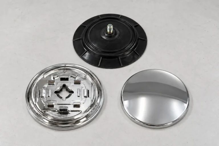 Black suction cup, keyed chrome base and front cover arranged as replacement bathroom accessory mounting components.