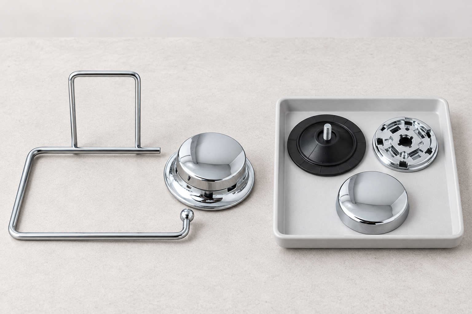 Koitor suction tissue holder beside an additional same-design replacement component set.