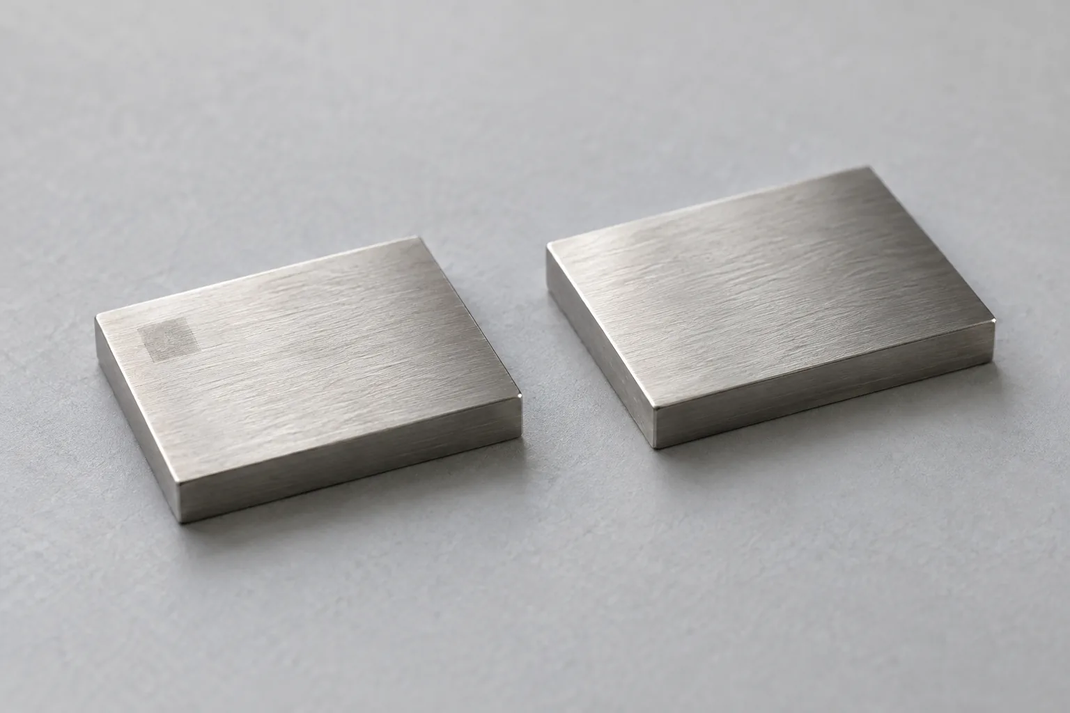 Conceptual stainless hardware samples for a laser-marking and surface-review discussion.