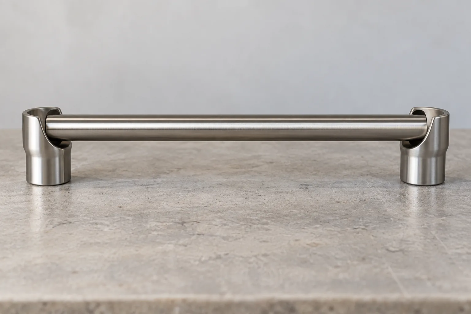 Metal closet rod seated in two socket supports