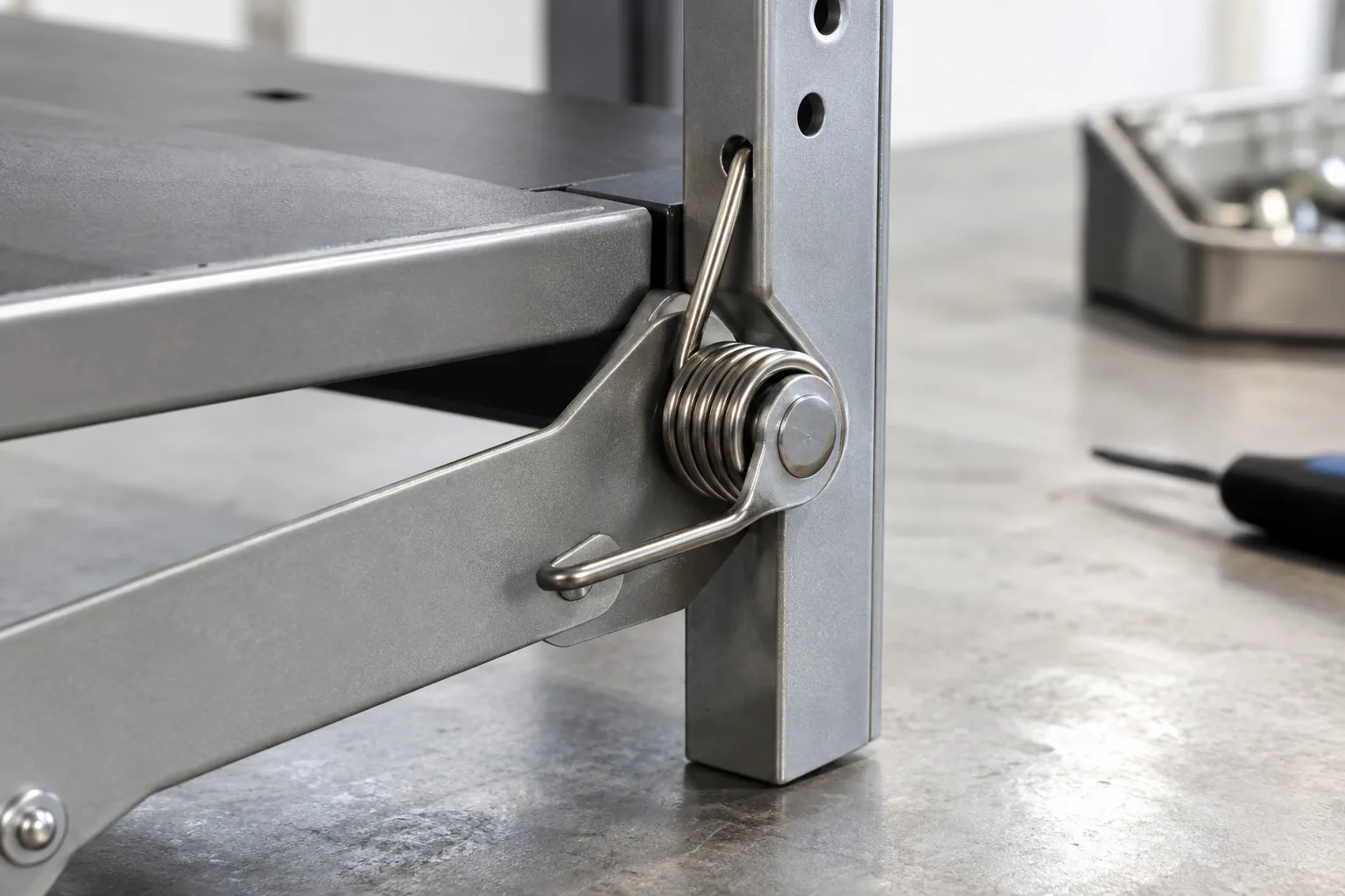 Torsion Spring Hand and Leg Angle in Storage Hardware: relevant hardware sample and component interface on a sourcing review bench.