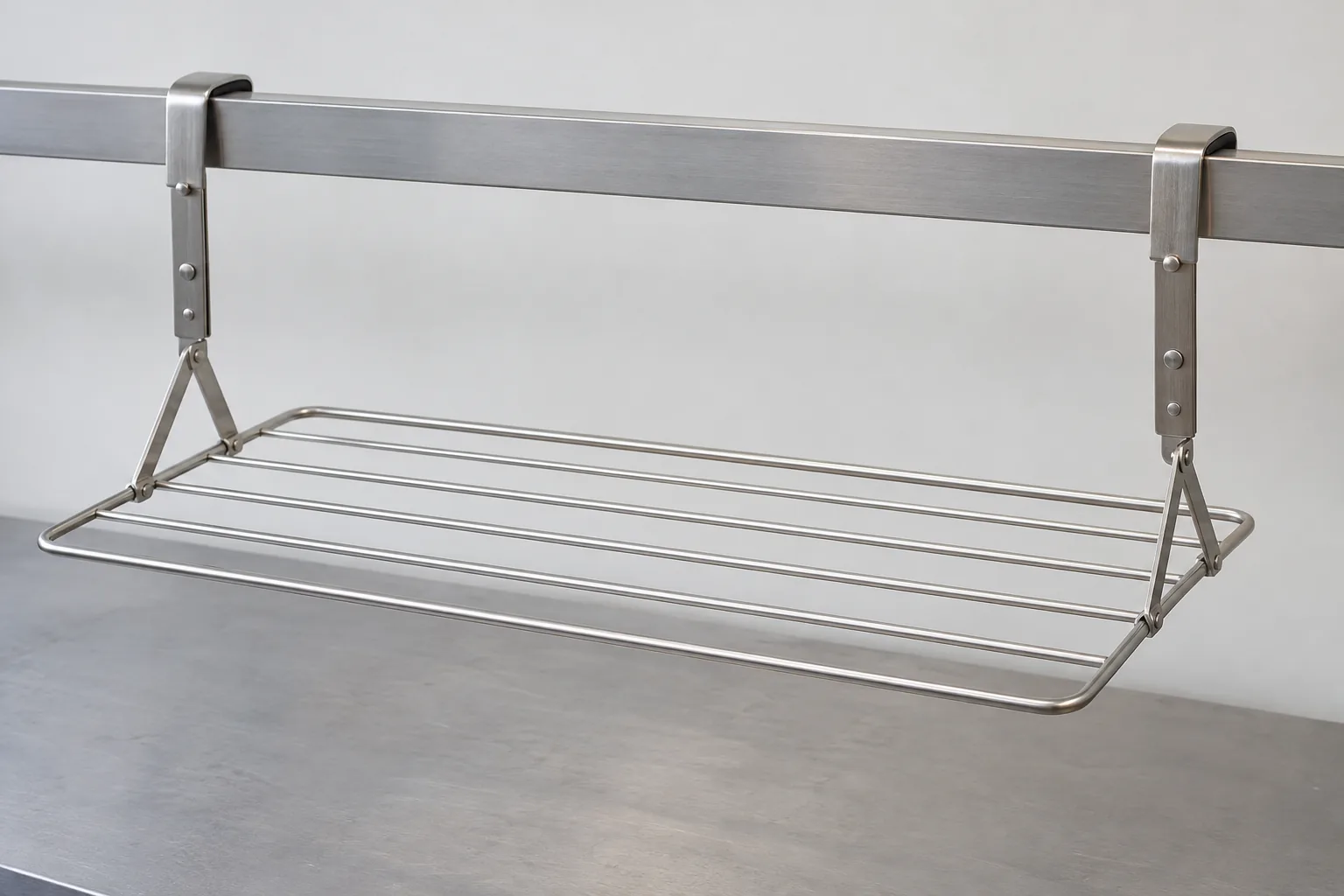Generic metal drying rack supported by two adjustable arms over a cool sample rail.