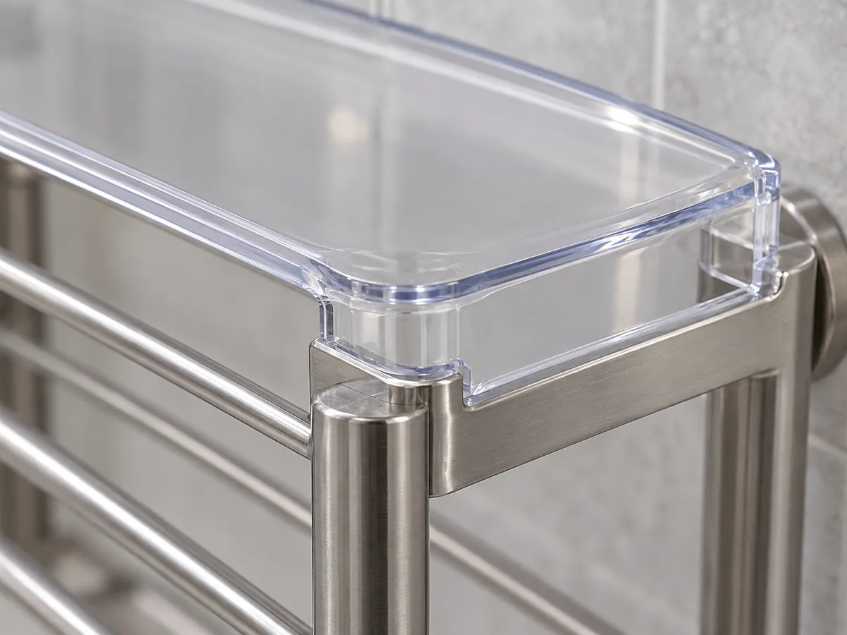 Close-up showing a generic clear cover edge fitted to a metal bathroom organizer frame