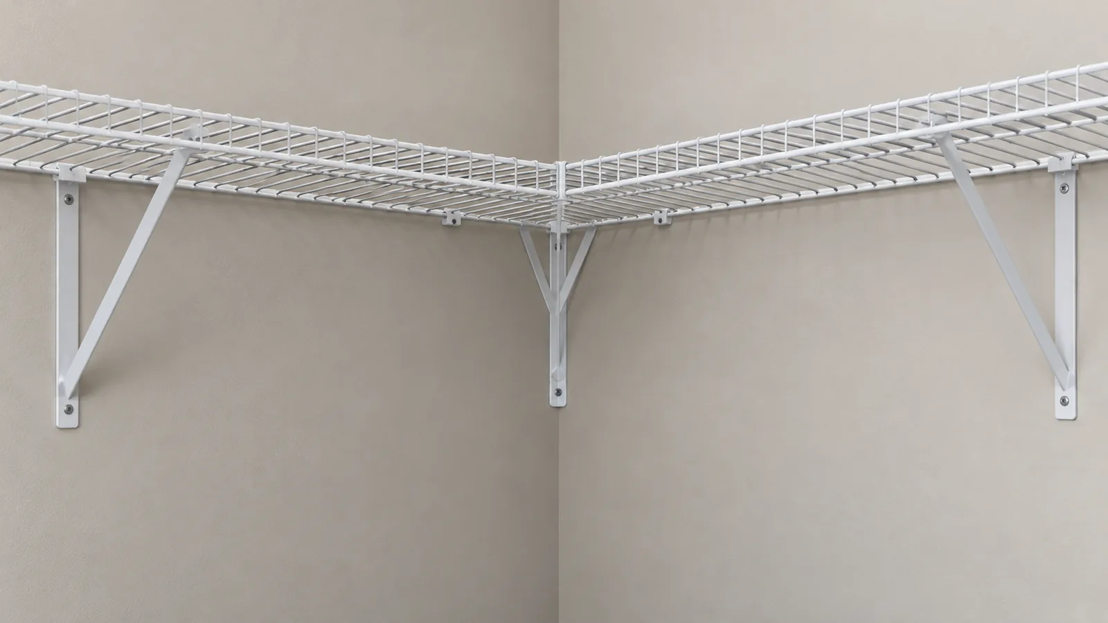 Conceptual L-shaped wire shelving run meeting at a corner with a dedicated support beneath the joint.